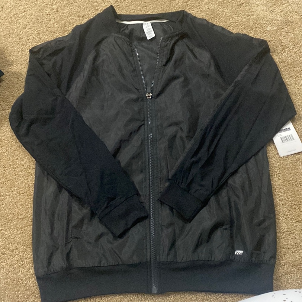 Black womens wind jacket.